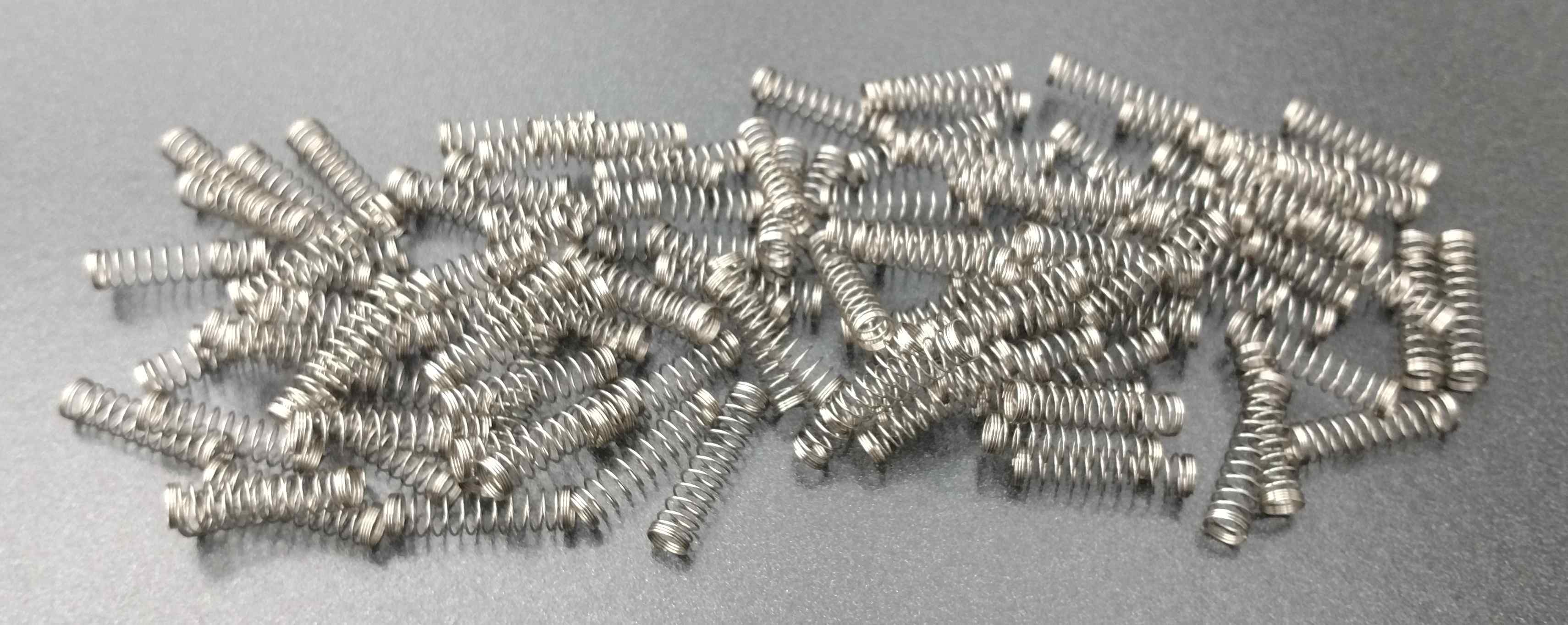 A pile of springs. Some are annoyingly intertwined.