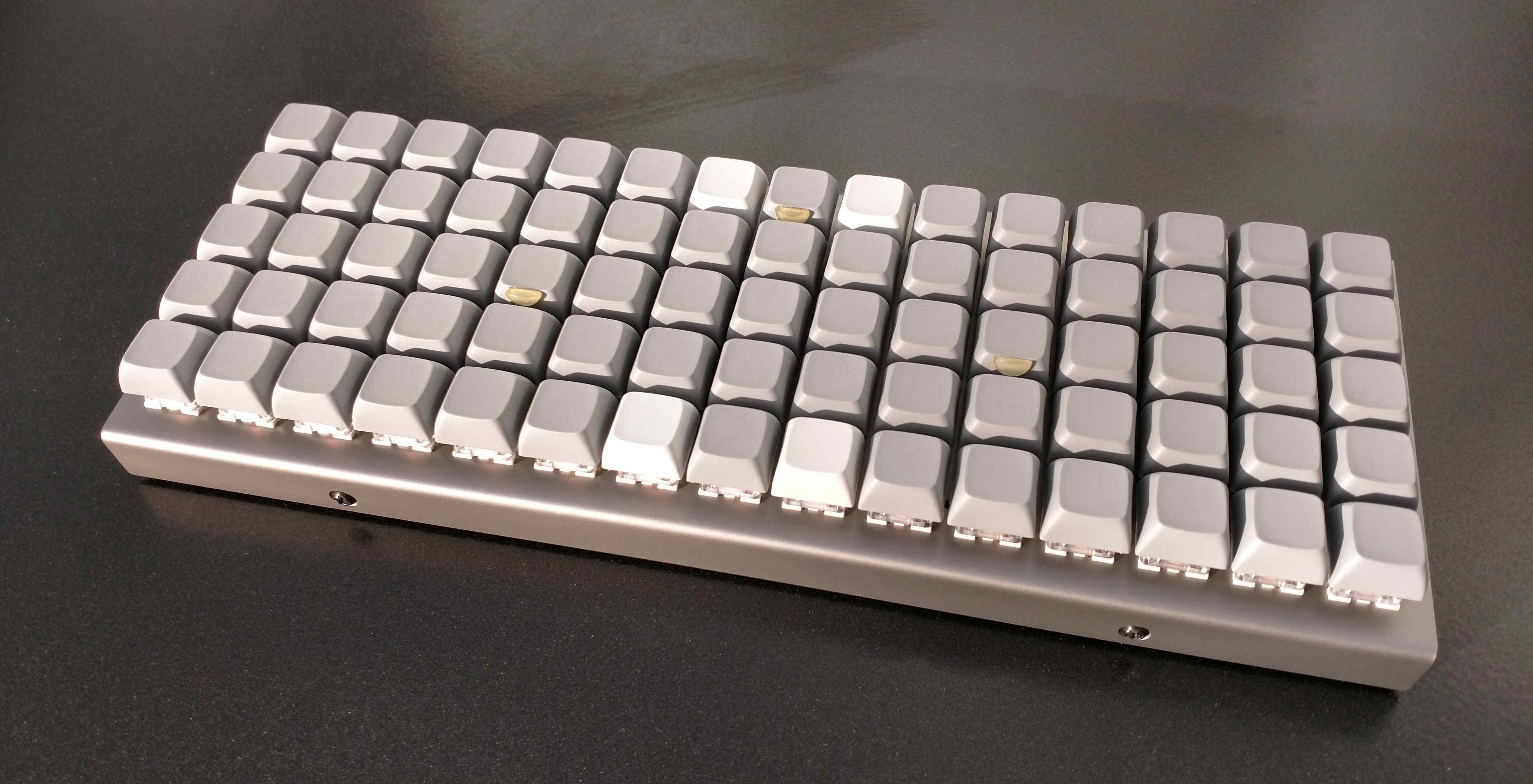 XD75 featuring an even more suprisingly creative and beautiful pattern of gray and white XDA keycaps.